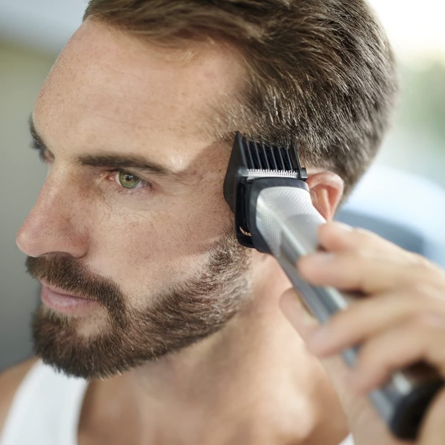 Philips Series 7000 12-in-1 All-In-One Trimmer, Ultimate Grooming Kit for Beard, Hair & Body with 12 Attachments, Including Nose Trimmer, Premium Metal Handle, UK 3-Pin Plug - MG7735/33